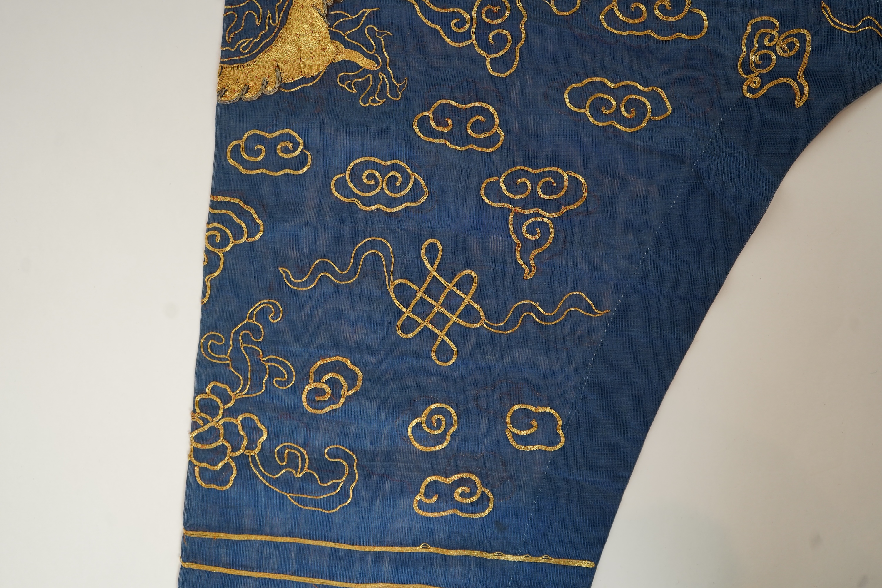 A Chinese gold thread and silk gauze ‘dragon’ summer robe, jifu, early 20th century
